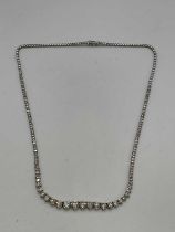 An 18ct white gold and diamond graduated Riviera necklace set with one hundred and one round
