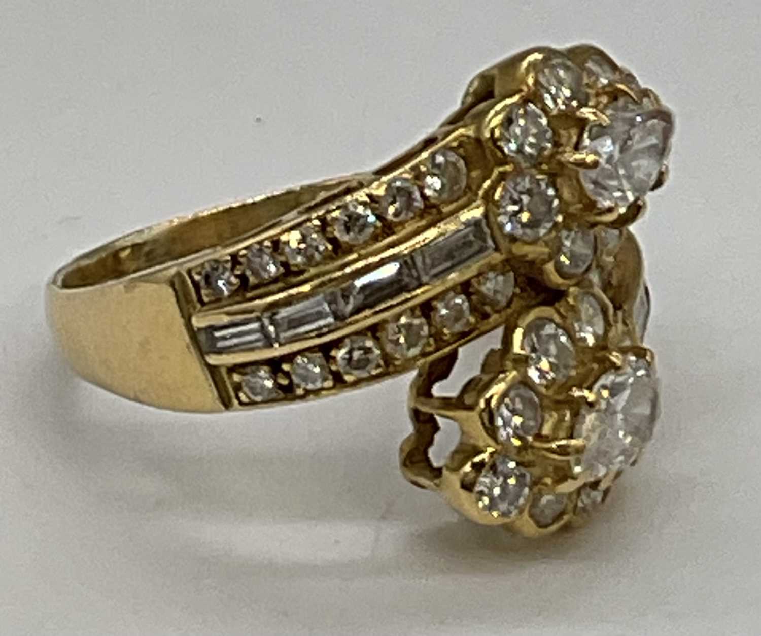 A yellow metal and diamond set crossover ring, each main section set with a pear shaped diamond each - Image 4 of 6