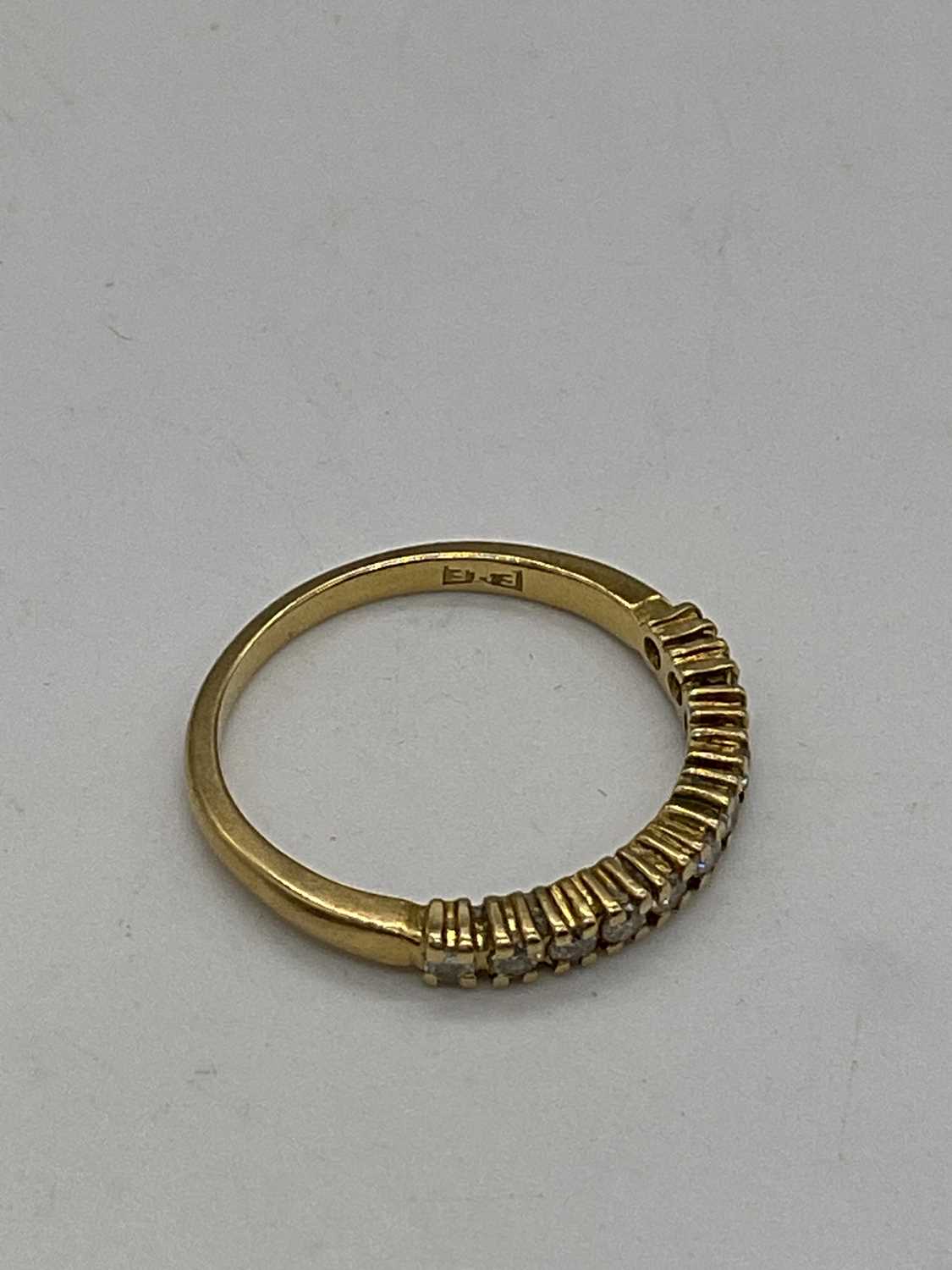 An 18ct yellow gold and diamond set half eternity ring with eleven small round brilliant cut - Image 3 of 5