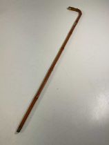 A bamboo sword stick with stiletto blade- collar dated 1908. Length; 91cm - length of stiletto 44.