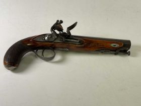 J.M. & ADAMS; an early 19th century flintlock pistol with octagonal barrel, chequered stock and