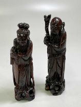 A pair of Chinese carved rootwood figures