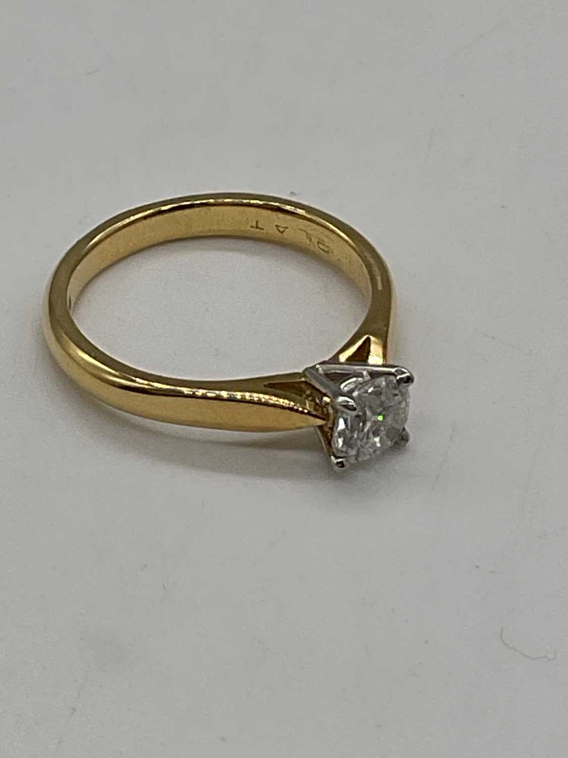 An 18ct yellow gold diamond solitaire ring, the four claw set round brilliant cut stone approx. 0. - Image 2 of 3