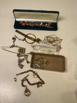 A quantity of jewellery, including a Victorian yellow metal fob chain with gold capped compass and