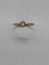 An 18ct yellow gold diamond solitaire ring, the old cut stone approx. 0.2cts, size N 1/2, approx.