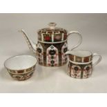 Royal Crown Derby teapot, cream jug and sugar bowl Condition Report: No visible damage, appears to