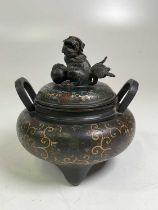 An early 19th century Chinese cloisonné twin handled bowl and cover, the cover with Dog of Fo