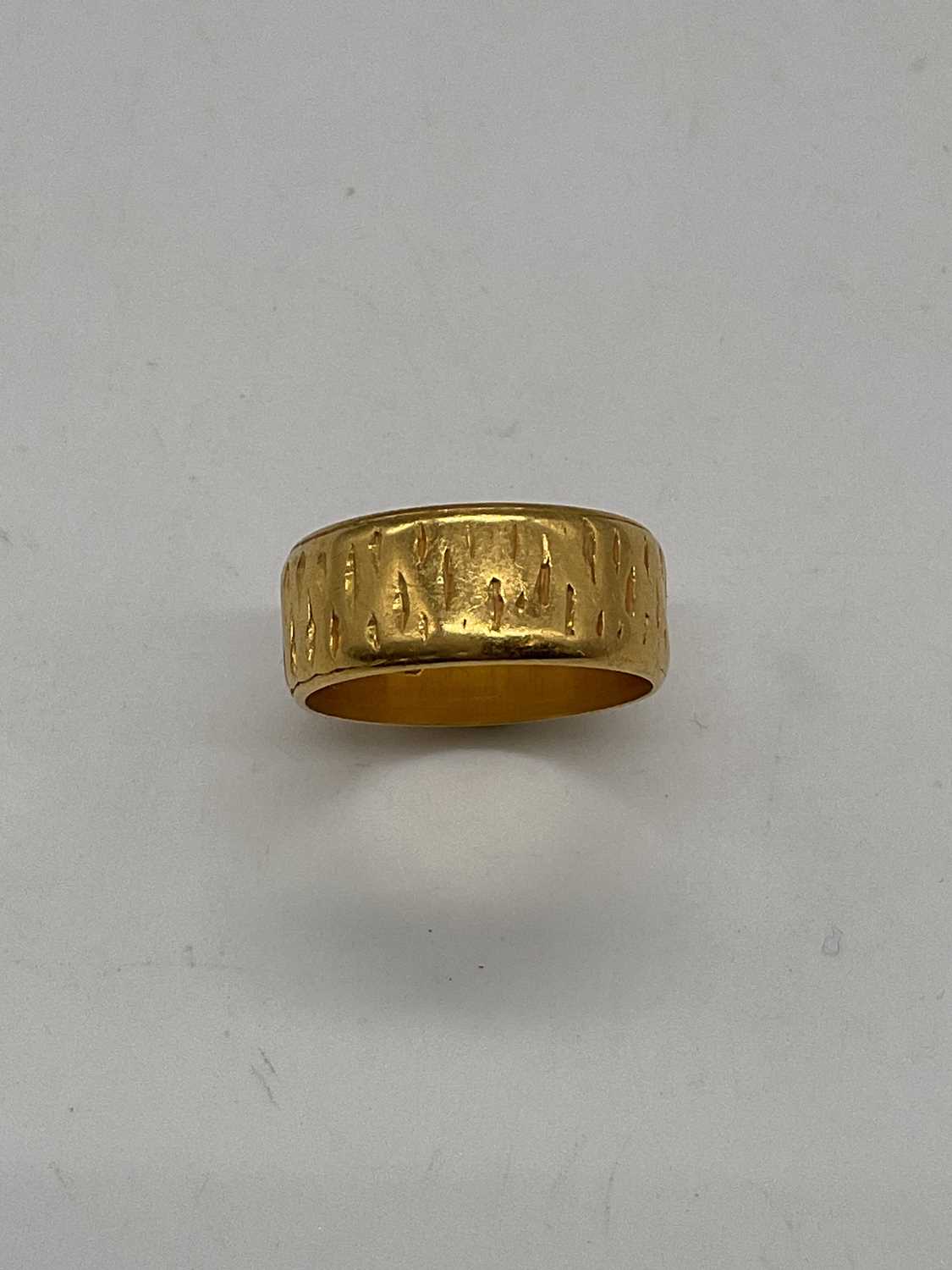 A 22ct yellow gold wedding band with engraved detail and inscription to the inner band, size K 1/ - Image 2 of 4