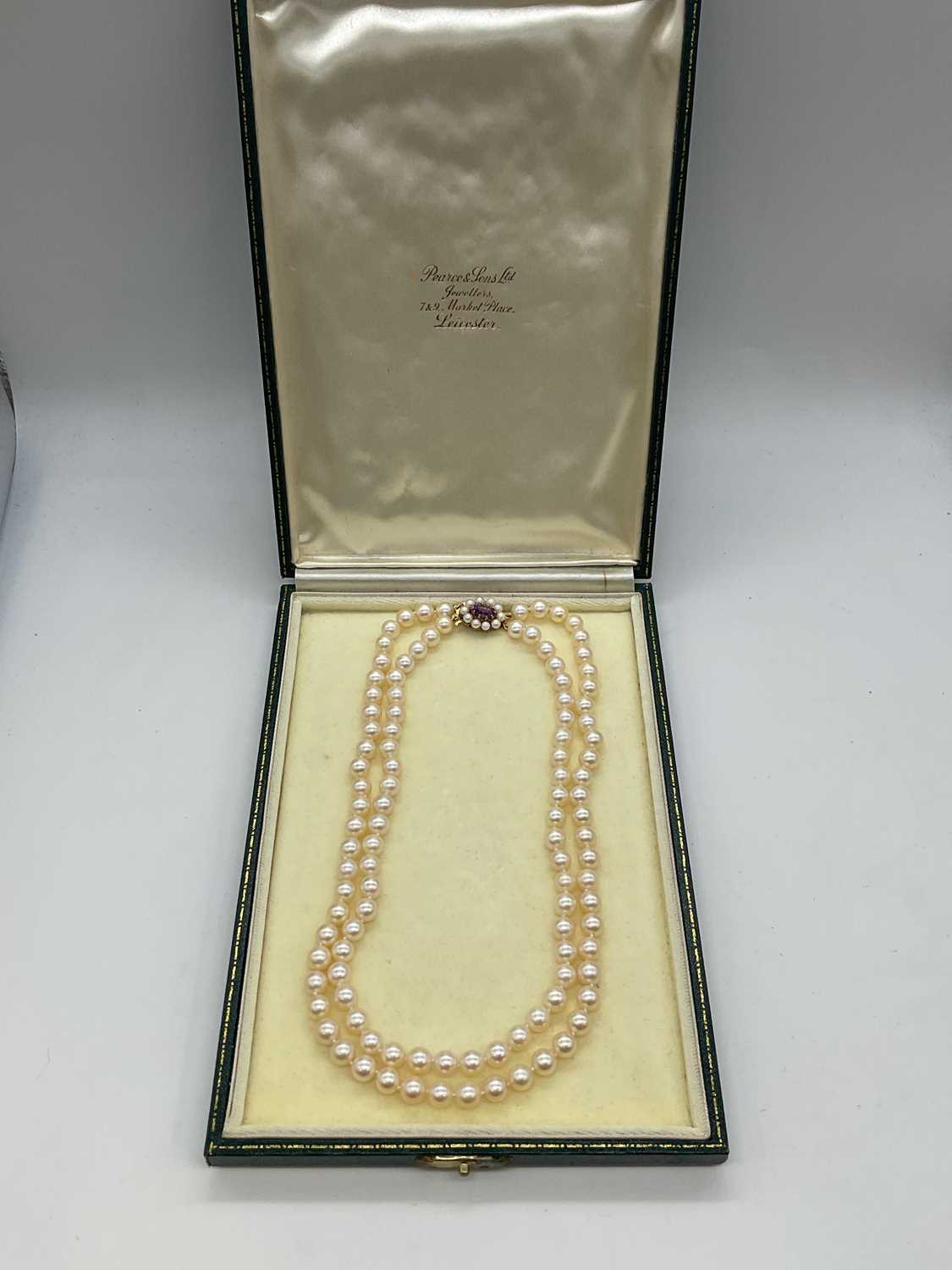 A hand tied double strand of pearls with 9ct yellow gold amethyst and pearl clasp, length 40cm, - Image 4 of 4