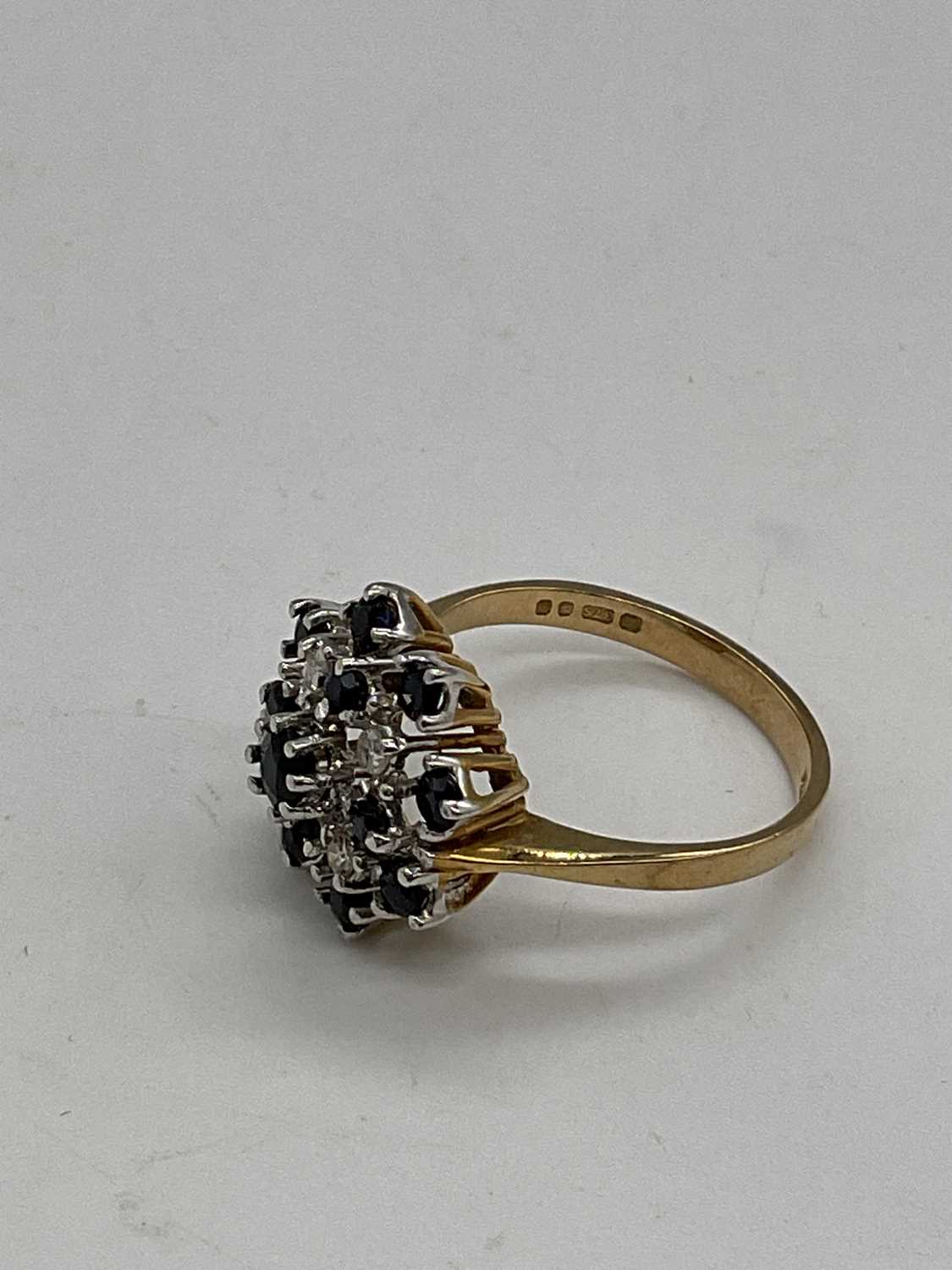 A 9ct yellow gold sapphire and diamond stepped floral cluster ring, size Q, approx. 3.9g. - Image 4 of 4