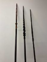 Three carved Solomon Islands Spears, bought by vendor in the late 1950s, length 251cm