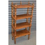 A Victorian style stained beech four tier whatnot on turned supports, width 56cm, height 125cm.