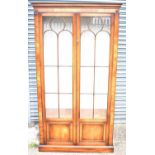 A reproduction mahogany display cabinet with pair of glazed doors, width 110.5cm, height 201cm.