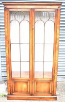 A reproduction mahogany display cabinet with pair of glazed doors, width 110.5cm, height 201cm.