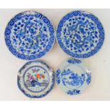 A pair of 20th century Japanese blue and white chargers decorated with dragons, diameter 30cm,