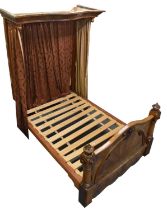 A Victorian mahogany half tester double bedstead complete with canopy, width 147cm.