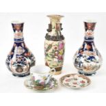 A pair of Japanese Imari baluster form vases height 23cm, a crackle glaze vase, a cup and saucer and