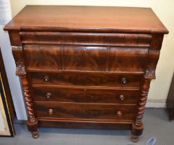 A large Victorian mahogany Scotch type chest with cushion drawer above three deep cushion drawers