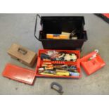 A large modern toolbox with contents, also a Black and Decker work bench (2).