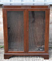 An early 20th century mahogany bookcase with two glazed doors, width 92.5cm.