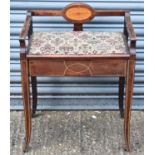 An Edwardian inlaid piano stool with hinged storage seat.
