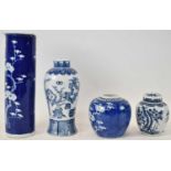 A Chinese blue and white vase, height 23cm, a taller sleeve vase (badly af), and two ginger jars,