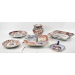 Two Japanese Imari platters, 32 x 32cm, and 35 x 31cm, also a charger, diameter 30cm, another