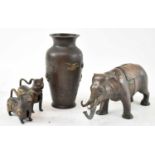 A Japanese bronze vase, height 18cm, two Eastern bronze incense burners modelled as animals, both