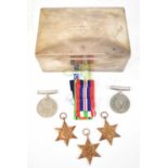 A collection of World War II memorabilia relating to Surgeon Lieutenant Alexander William Kennett