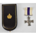 An unnamed British Military Cross in case of issue.