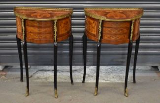 A pair of reproduction French style inlaid three drawer side tables with gilt metal mounts, width