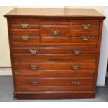 A late 19th century walnut chest of eight assorted drawers, width 122cm, height 122cm.