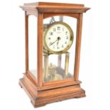 GUSTAV BECKER; an early 20th century mahogany cased torsion clock, the enamel dial marked for S