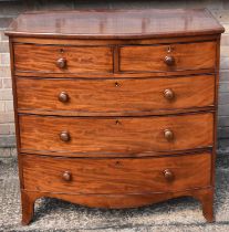 A 19th century mahogany bowfronted chest of two short and three long drawers, width 103cm, height