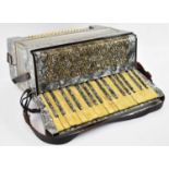 A vintage Geraldo piano accordion, cased.