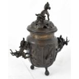 A Japanese late Meiji period bronze censer with cover, height 22.5cm.