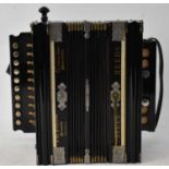 INTERNATIONAL ACCORDION COMPANY; an early 20th century button accordion.