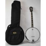 A modern Ozark custom tonebell tenor banjo type SB serial number N16812, with soft case.