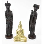 Two 20th century Chinese carved hardwood figures and a small brass figure of a Buddha (3).