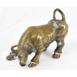 A Chinese bronze figure of a bull, length 12cm.
