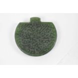 An Islamic carved green hardstone seal, height 5cm.