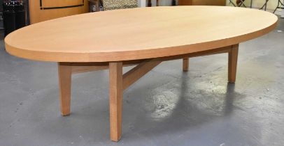 A very large modern oak oval dining table, 295 x 160cm.