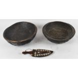 TRIBAL ART; a large African carved wooden bowl with cover, diameter 38cm and a dagger, the