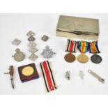 A group of three WWI medals, awarded to Sgt. A. J. Weller, to include British War Medal and