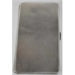 E J TREVITT & SONS LTD; a George V hallmarked silver cigarette case, Chester 1933, approx. 6.78ozt/