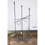 A contemporary wrought metal three-light standard lamp, height at tallest approx. 145cm.