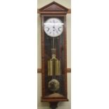 COMITTI OF LONDON; a mahogany cased Vienna style wall clock, height approx. 105cm.