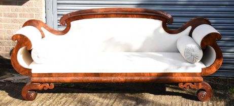 A large 19th century Continental mahogany framed scroll arm sofa, width approx. 215cm.