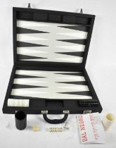 DAL NEGRO; a modern attaché case style backgammon set, width 52cm.