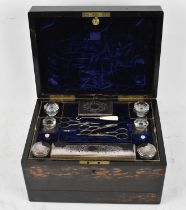 LUND, LONDON; a 19th century coromandel cased vanity set with part fitted interior, with purchase